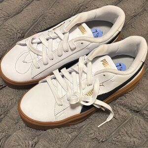 PUMA Men's White Sneakers with Black and Gold Highlights